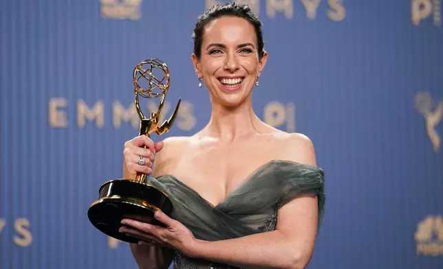 Kate O'Flynn poses in the press room with the award for outstanding supporting actress in a comedy series for "Widow's Bay" during the 78th Emmy Awards on Monday, Sept. 14, 2026, at the JW Marriott in Los Angeles. (Photo by Richard Shotwell/Invision/AP)