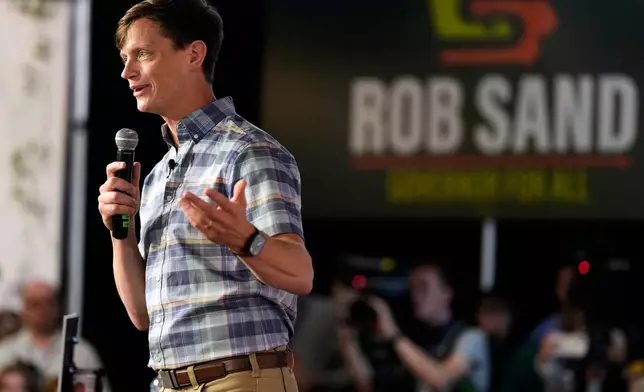 FILE - Iowa Democratic gubernatorial candidate Rob Sand speaks during a campaign rally, June 7, 2026, in Des Moines, Iowa. (AP Photo/Charlie Neibergall, File)