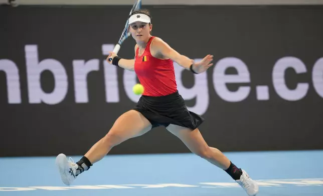 Belgium's Jana Otzipka, returns a ball to Ukraine's Anhelina Kalinina during the Billie Jean King Cup quarterfinals tennis match in Shenzhen, China's Guangdong province, Thursday, Sept. 24, 2026. (AP Photo/Andy Wong)
