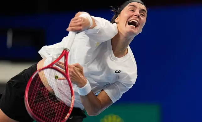 Ukraine's Anhelina Kalinina, returns a ball to Belgium's Jana Otzipka during the Billie Jean King Cup quarterfinals tennis match in Shenzhen, China's Guangdong province, Thursday, Sept. 24, 2026. (AP Photo/Andy Wong)