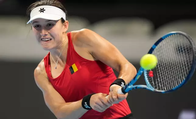 Belgium's Jana Otzipka, returns a ball to Ukraine's Anhelina Kalinina during the Billie Jean King Cup quarterfinals tennis match in Shenzhen, China's Guangdong province, Thursday, Sept. 24, 2026. (AP Photo/Andy Wong)