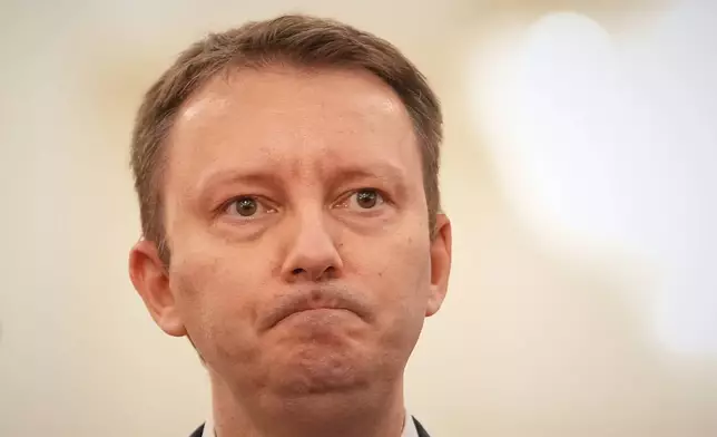 Romanian Prime Minister designate and European Parliament member Siegfried Muresan looks on during a press conference in Bucharest, Romania, Friday, Sept. 18, 2026. (AP Photo/Andreea Alexandru)