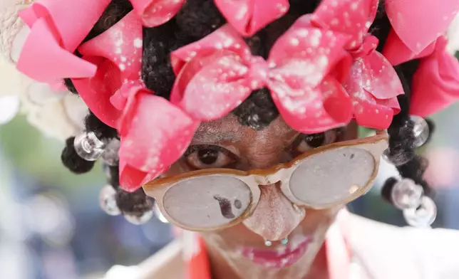 Members of the Belmont Baby Dolls pose for a photo as they wait for the start of the West Indian Day Parade on Monday, Sept. 7, 2026, in the Brooklyn borough of New York. (AP Photo/Heather Khalifa)