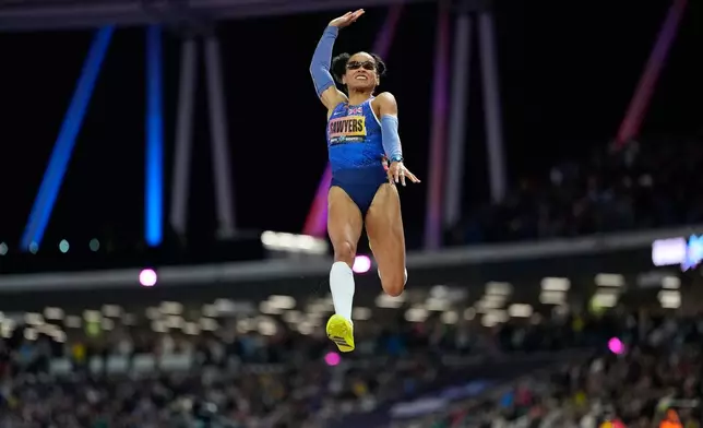 Jazmin Sawyers, of Britain, makes an attempt in the women's long jump final at the World Athletics Ultimate Championship in Budapest, Hungary, Friday, Sept. 11, 2026. (AP Photo/Matthias Schrader)