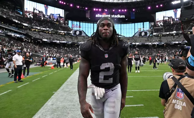 Las Vegas Raiders running back Ashton Jeanty walks off the field after an NFL football game against the Miami Dolphins, Sunday, Sept. 13, 2026, in Las Vegas. (AP Photo/David Becker)