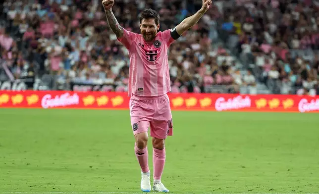 Inter Miami forward Lionel Messi celebrates after scoring on a free kick during the first half of an MLS soccer game against San Diego FC, Sunday, Sept. 20, 2026, in Miami. (AP Photo/David Santiago)