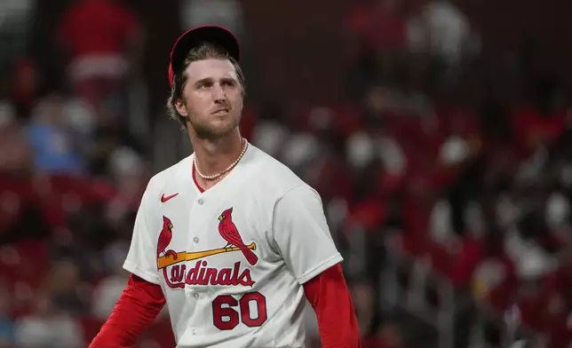 St. Louis Cardinals starting pitcher Quinn Mathews heads off the field after being removed during the seventh inning of a baseball game against the San Francisco Giants Monday, Sept. 14, 2026, in St. Louis. (AP Photo/Jeff Roberson)