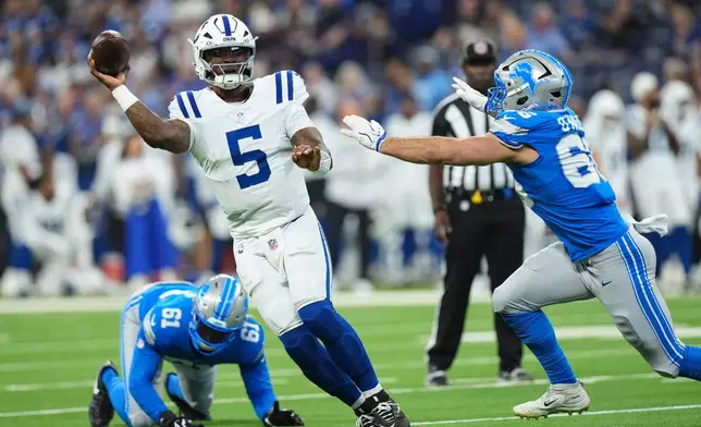 Indianapolis Colts quarterback Anthony Richardson Sr. (5) throws past Detroit Lions defensive tackle Eric O'Neill (66) during the first half of a preseason NFL football game in Indianapolis, Saturday, Aug. 29, 2026. (AP Photo/AJ Mast)
