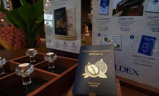 A "Durian Passport" is displayed at KLDEX (Kuala Lumpur Durian Experience Centre) in Kuala Lumpur, Malaysia, Friday, June 26, 2026. (AP Photo/Vincent Thian)