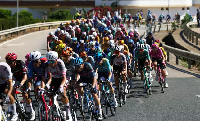 Cyclists ride during the 19th stage of the Spanish Vuelta cycling race, from Vélez-Málaga to Peñas Blancas in Estepona, Spain, Friday, Sept. 11, 2026. (Álex Zea/Europa Press via AP) **SPAIN OUT**