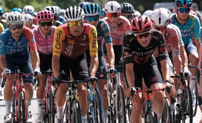 Cyclists ride during the 19th stage of the Spanish Vuelta cycling race, from Vélez-Málaga to Peñas Blancas in Estepona, Spain, Friday, Sept. 11, 2026. (AP Photo/Gregorio Marrero)