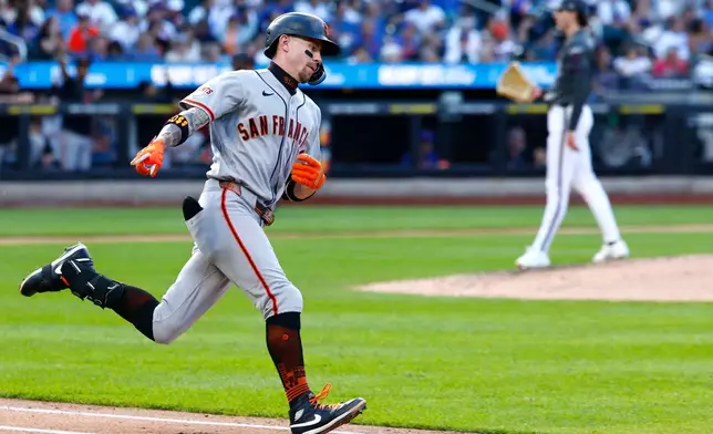 San Francisco Giants' third baseman Christian Koss (50) runs the bases after hitting a home run against New York Mets pitcher Zac Thornton during the fifth inning of a baseball game, Saturday, Sept. 5, 2026, in New York. (AP Photo/Noah K. Murray)