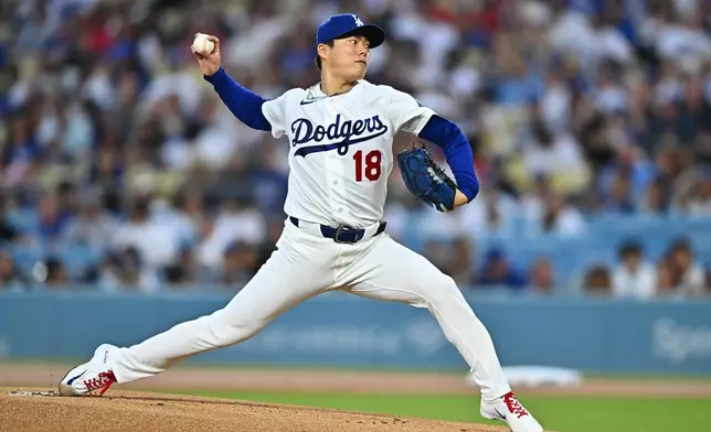 Los Angeles Dodgers pitcher Yoshinobu Yamamoto delivers during the first inning of a baseball game against the St. Louis Cardinals, Wednesday, Sept. 2, 2026, in Los Angeles. (AP Photo/William Liang)