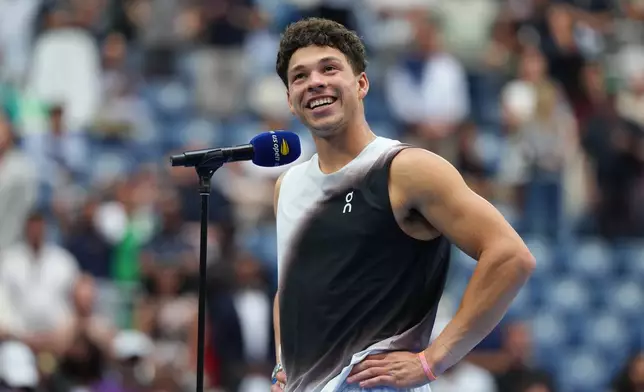 Ben Shelton, of the United States, speaks after he lost the men's singles final of the U.S. Open tennis championships against Alexander Zverev, of Germany, Sunday, Sept. 13, 2026, in New York. (AP Photo/Kirsty Wigglesworth)