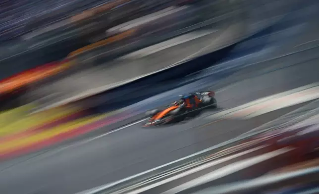 McLaren driver Lando Norris of Britain steers his car during the qualifying session ahead of the Spanish Formula One Grand Prix in Madrid, Saturday, Sept. 12, 2026. (AP Photo/Manu Fernandez)