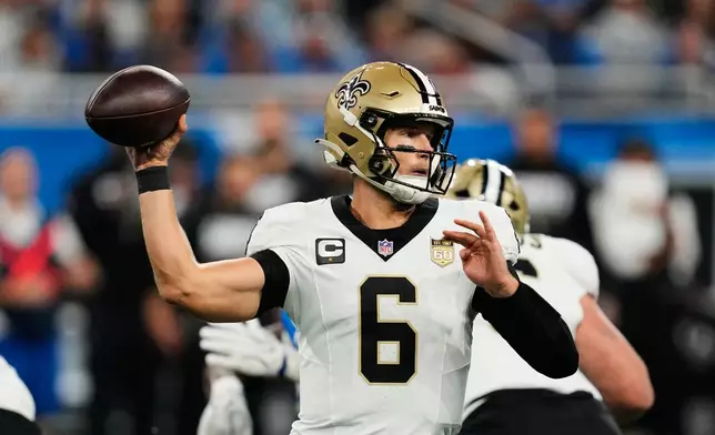 New Orleans Saints quarterback Tyler Shough (6) passes in the first half of an NFL football game against the Detroit Lions, Sunday, Sept. 13, 2026, in Detroit. (AP Photo/Paul Sancya)