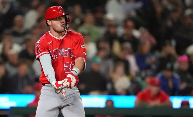 Los Angeles Angels' Mike Trout reacts to striking out during the third inning of a baseball game against the Seattle Mariners, Saturday, Sept. 26, 2026, in Seattle. (AP Photo/Lindsey Wasson)