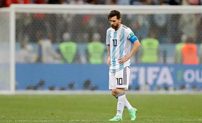 FILE - Argentina's Lionel Messi walks along the pitch at the end of the group D match against Croatia at the 2018 soccer World Cup in Nizhny Novgorod, Russia, June 21, 2018. Croatia defeated Argentina 3-0. (AP Photo/Ricardo Mazalan, File)