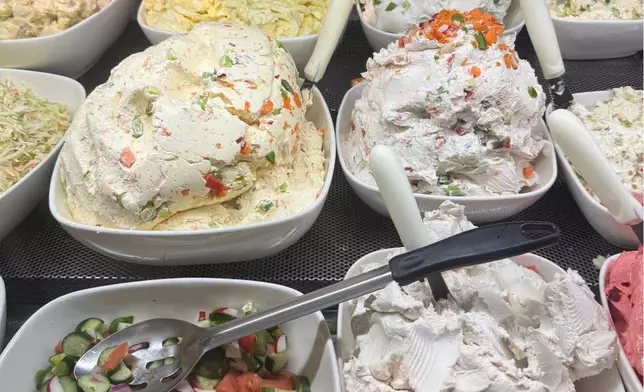 Various cream cheeses and other bagel fixings appear at Tal Bagels in New York on Sept. 13, 2026. (Katie Workman via AP)