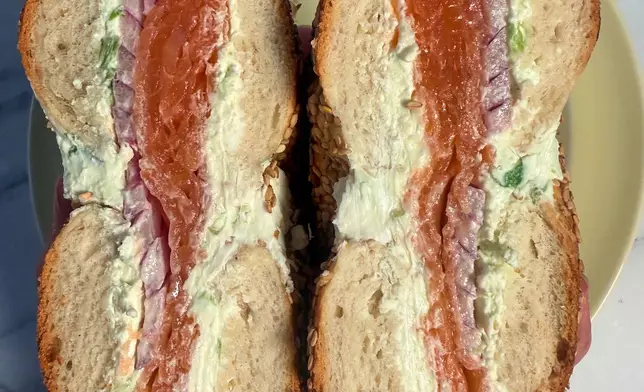 A bagel with smoked salmon, scallion cream cheese, and red onion, from Tal Bagels appears in New York on Sept. 13, 2026. (Katie Workman via AP)