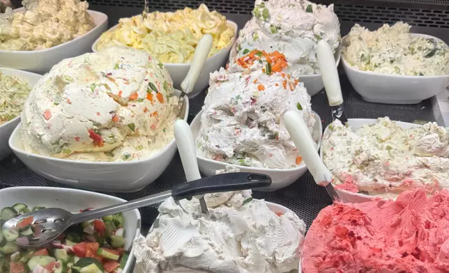 Various cream cheeses and bagel fixings appear at Tal Bagels in New York on Sept. 13, 2026. (Katie Workman via AP)