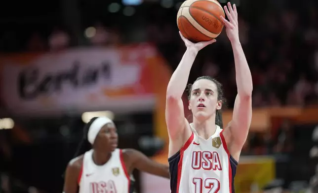United States' Caitlin Clark shoots a free throw during the Women's Basketball World Cup match between China and the United States in Berlin, Friday, Sept. 4, 2026. (AP Photo/Ebrahim Noroozi)