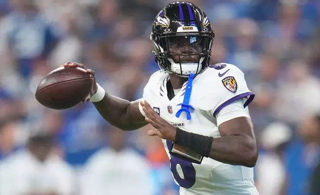 Baltimore Ravens' Lamar Jackson throws during the first half of an NFL football game against the Indianapolis Colts Sunday, Sept. 13, 2026, in Indianapolis. (AP Photo/Jeff Roberson)