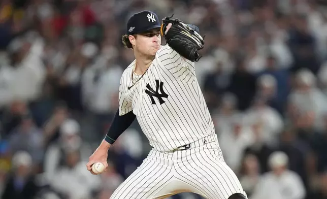New York Yankees starting pitcher Cam Schlittler throws to the Boston Red Sox during the sixth inning in Game 1 of baseball's American League Wild Card Series, Tuesday, Sept. 29, 2026, in New York. (AP Photo/Frank Franklin II)