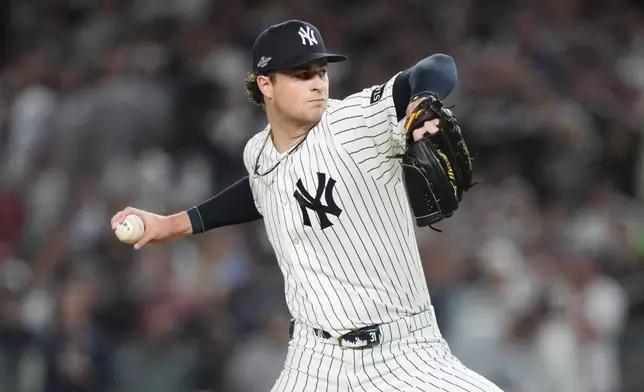 New York Yankees starting pitcher Cam Schlittler throws to the Boston Red Sox during the first inning in Game 1 of baseball's American League Wild Card Series, Tuesday, Sept. 29, 2026, in New York. (AP Photo/Frank Franklin II)