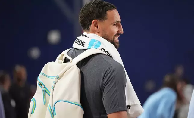 Miami Heat guard Klay Thompson walks from the court during NBA basketball training camp, Tuesday, Sept. 29, 2026, in Boca Raton, Fla. (AP Photo/Lynne Sladky)