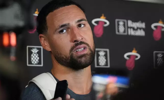 Miami Heat guard Klay Thompson speaks with the media during NBA basketball training camp, Tuesday, Sept. 29, 2026, in Boca Raton, Fla. (AP Photo/Lynne Sladky)