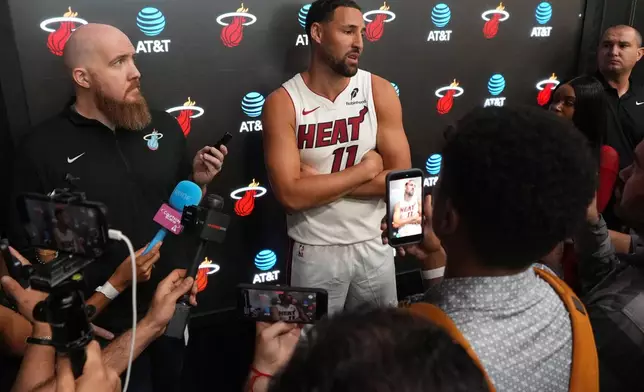 Miami Heat forward Klay Thompson (11) takes questions during the NBA basketball team's media day, Monday, Sept. 28, 2026, in Miami. (AP Photo/Jim Rassol)