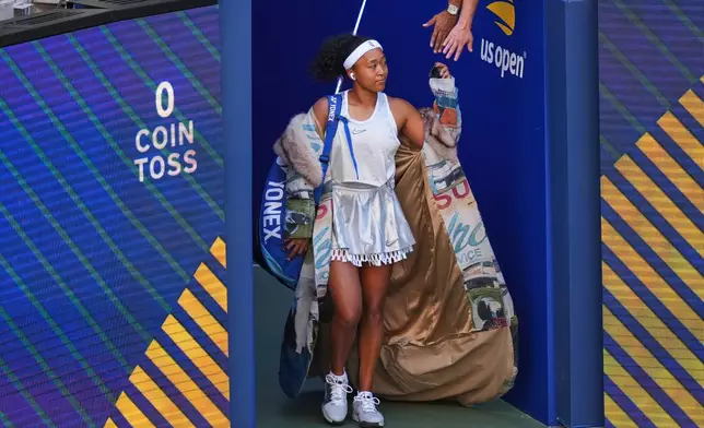 Naomi Osaka, of Japan, arrives for a match against Elena Rybakina, of Kazakhstan, during the fourth round of the U.S. Open tennis championships, Monday, Sept. 7, 2026, in New York. (AP Photo/Kirsty Wigglesworth)