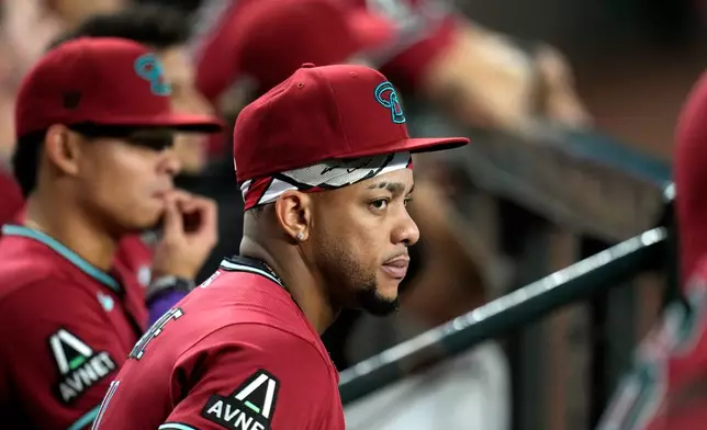 Arizona Diamondbacks' Ketel Marte pauses in the team dugout during the fifth inning of a baseball game against the Philadelphia Phillies, Wednesday, Sept. 2, 2026, in Phoenix. (AP Photo/Ross D. Franklin)