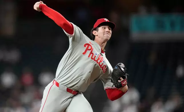 Philadelphia Phillies starting pitcher Andrew Painter throws against the Arizona Diamondbacks during the first inning of a baseball game, Wednesday, Sept. 2, 2026, in Phoenix. (AP Photo/Ross D. Franklin)