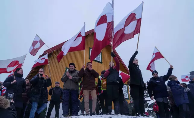 FILE - People protest against Trump's policy towards Greenland in front of US consulate in Nuuk, Greenland, Jan. 17, 2026. (AP Photo/Evgeniy Maloletka, File)