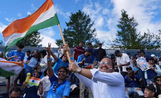 Fans of India cheer before the India vs Japan Suzuki Cup T20 cricket match in Sano, Japan, Tuesday, Sept. 22, 2026, marking 75 years of diplomatic relations between the two countries. (AP Photo/Tomohiro Ohsumi)