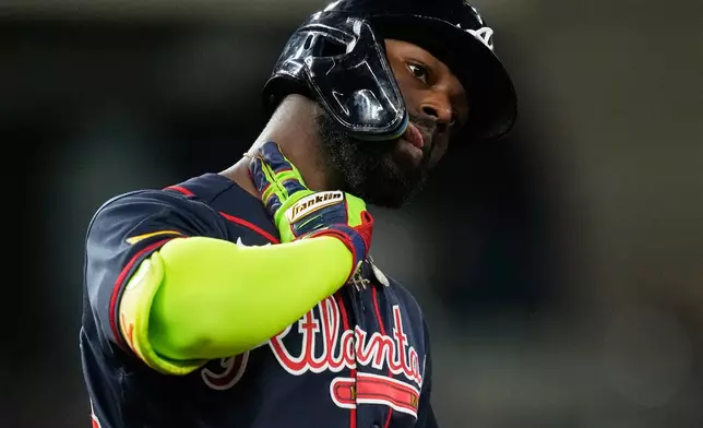 Atlanta Braves' Michael Harris II celebrates as he runs the bases after hitting a home run during the fourth inning of a baseball game against the Houston Astros in Houston, Friday, Sept. 18, 2026. (AP Photo/Ashley Landis)