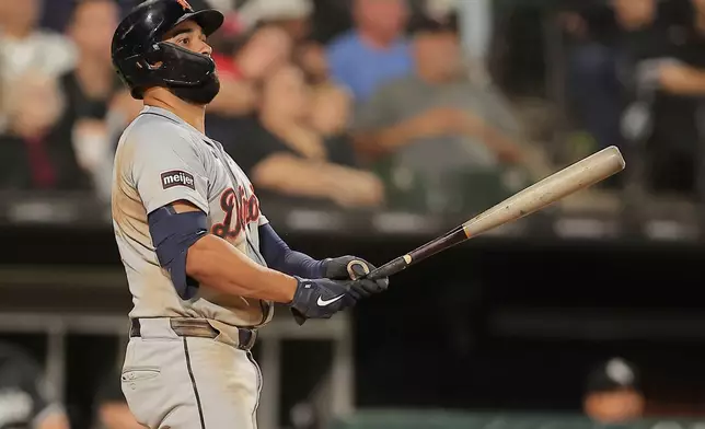 Detroit Tigers' Riley Greene watches his two-run home run during the eighth inning of a baseball game against the Chicago White Sox, Friday, Sept. 18, 2026, in Chicago. (AP Photo/Melissa Tamez)
