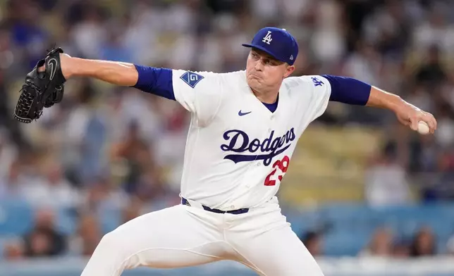 Los Angeles Dodgers pitcher Tarik Skubal throws to the plate during the first inning of a baseball game against the Cincinnati Reds, Tuesday, Sept. 8, 2026, in Los Angeles. (AP Photo/Mark J. Terrill)