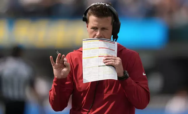 Arizona Cardinals head coach Mike LaFleur walks on the sideline during the second half of an NFL football game against the Los Angeles Chargers, Sunday, Sept. 13, 2026, in Inglewood, Calif. (AP Photo/Gregory Bull)