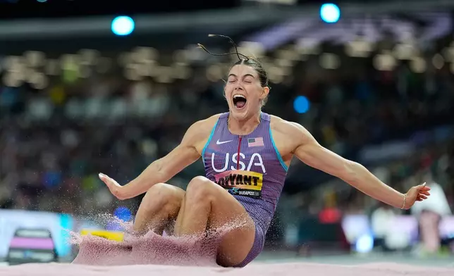 Claire Bryant, of the United States, makes an attempt in the women's long jump final at the World Athletics Ultimate Championship in Budapest, Hungary, Friday, Sept. 11, 2026. (AP Photo/Matthias Schrader)