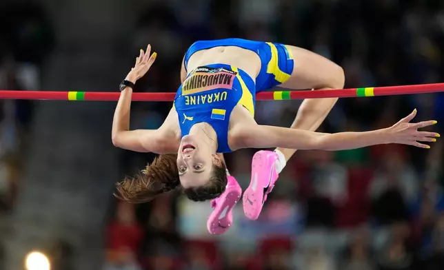 Yaroslava Mahuchikh, of Ukraine, makes an attempt in the women's high jump final at the World Athletics Ultimate Championship in Budapest, Hungary, Friday, Sept. 11, 2026. (AP Photo/Matthias Schrader)