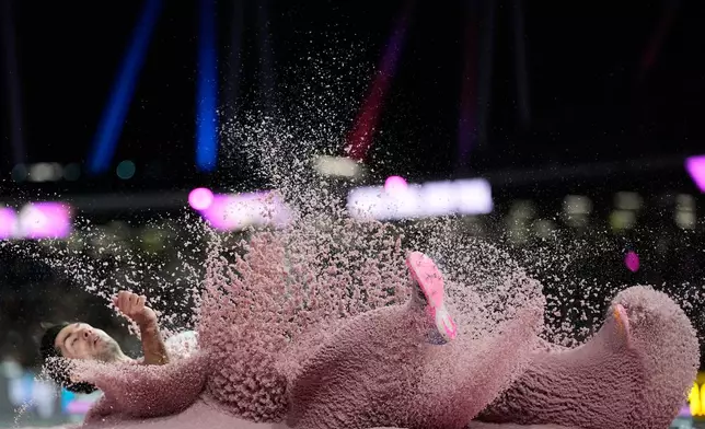 Miltiadis Tentoglou, of Greece, makes an attempt in the men's long jump final at the World Athletics Ultimate Championship in Budapest, Hungary, Saturday, Sept. 12, 2026. (AP Photo/Matthias Schrader)