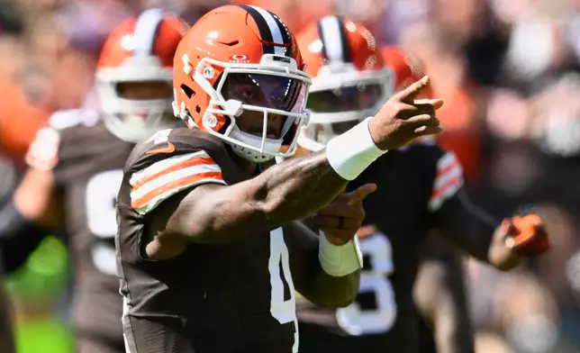 Cleveland Browns quarterback Deshaun Watson (4) reacts after a play against the Carolina Panthers during the first half of an NFL football game in Cleveland, Sunday, Sept. 27, 2026. (AP Photo/David Richard)