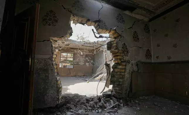 A hole on a wall is seen inside a home that Iranian media said was hit by a U.S. strike while a wedding celebration was taking place late Tuesday, Sept. 1, in Kuhestak, southern Iran, Friday, Sept. 4, 2026. (AP Photo/Vahid Salemi)