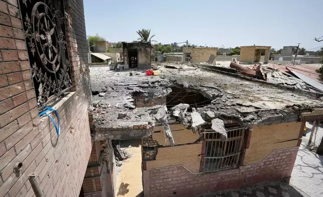The point of impact is seen on the roof of a building that Iranian media said was hit by a U.S. strike while a wedding celebration was taking place there late Tuesday, Sept. 1, in Kuhestak, southern Iran, Friday, Sept. 4, 2026. (AP Photo/Vahid Salemi)