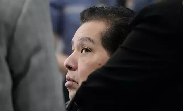 Philippines former House Speaker Martin Romualdez, a cousin of President Ferdinand Marcos Jr., waits for the start of his arraignment via video conference at the Quezon City Jail in Quezon, Philippines, Wednesday, Sept. 16, 2026. (AP Photo/Aaron Favila, Pool)