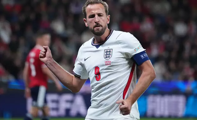 England's Harry Kane celebrates after scoring second goal during the UEFA Nations League soccer match between Czechia and England in Prague, Czechia, Tuesday, Sept. 29, 2026. (AP Photo/Petr David Josek)