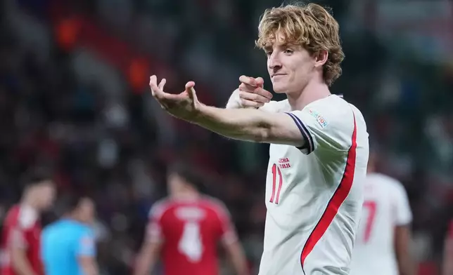 England's Anthony Gordon celebrates after scoring firts goal during the UEFA Nations League soccer match between Czechia and England in Prague, Czechia, Tuesday, Sept. 29, 2026. (AP Photo/Petr David Josek)